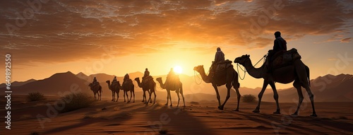 a caravan of Indian camels  led by experienced camel drivers  traversing the mesmerizing desert sand dunes at sunset. The warm hues of the setting sun should paint a stunning backdrop.