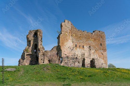 Toolse fortress which used to belong to teutonic order and crusaders of holy roman empire. Old fort in ruins - lots of cracks and cables holding it up. Medieval castle in Estonia