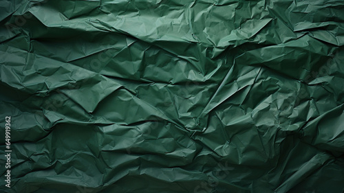 Green crumpled paper texture background