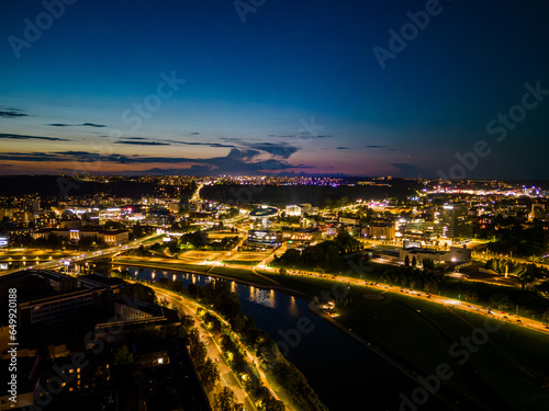 Aerial view of the city center of Vilnius city at night. Lithuania. Drone