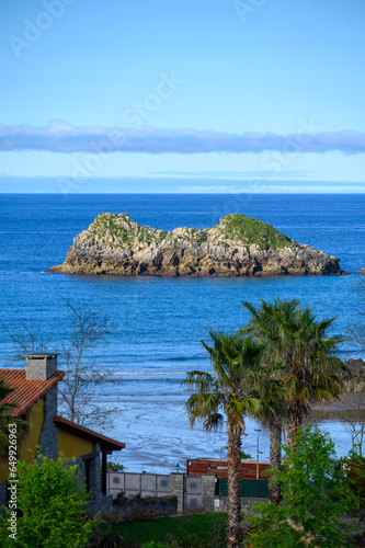 Vacation on Green coast of Asturias, views of Celorio village with sandy beaches, North of Spain © barmalini