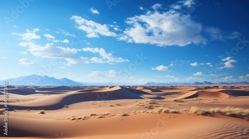 beige sandy desert under a clear blue sky