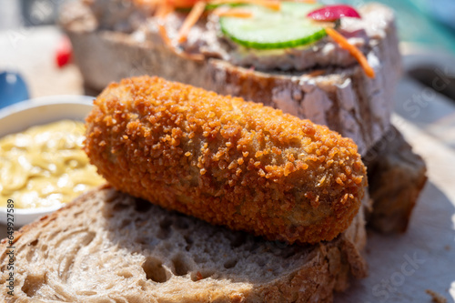 Dutch fast food, deep fried croquettes filled with ground beef meat served on bread
