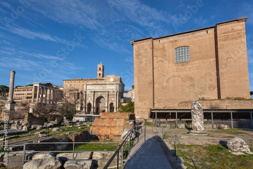 Roman Forum with Lapis Niger (venerated by the Roman people as the location of the tomb of Romulus) and Curia in the foreground, Rome, Italy photo