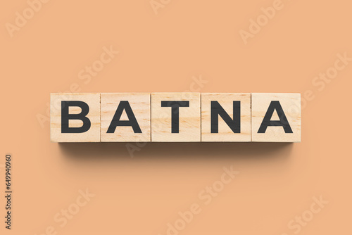BATNA (Best Alternative to a Negotiated Agreement) wooden cubes orange background