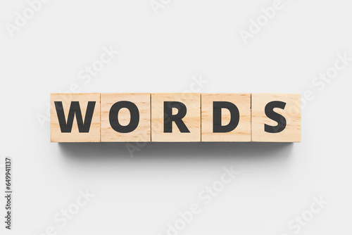 Words wooden cubes on grey background photo