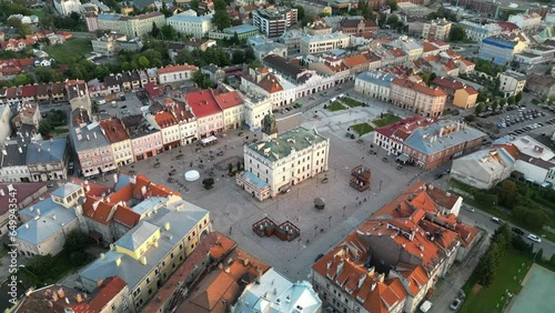  Jarosław, Subcarpathian, Poland - 10 September 2023: historic renaissance town square of Jaroslaw with town hall in the centre photo