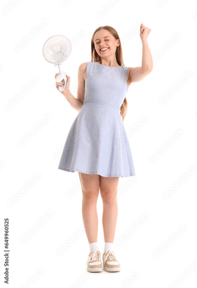 Happy young woman with electric fan on white background Happy young woman with electric fan on white background