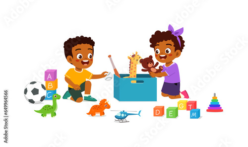 little kid put toy to the box with friend