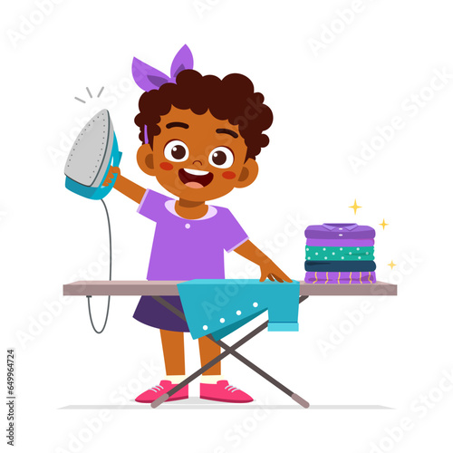 little kid ironing clothes and feel happy