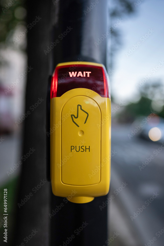 traffic light button with red light and wait stop signal, yellow box