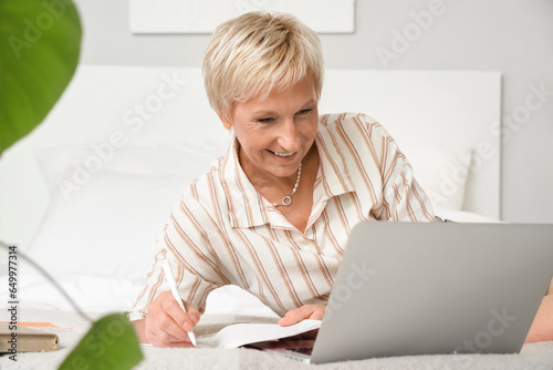 Mature woman learning Engli...