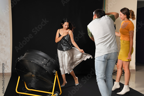 Male photographer and his a...