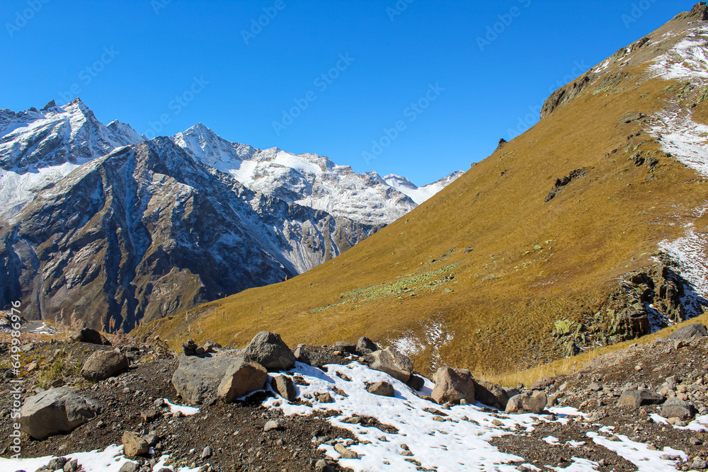 A beautiful panoramic landscape - the slopes of mountains with glaciers