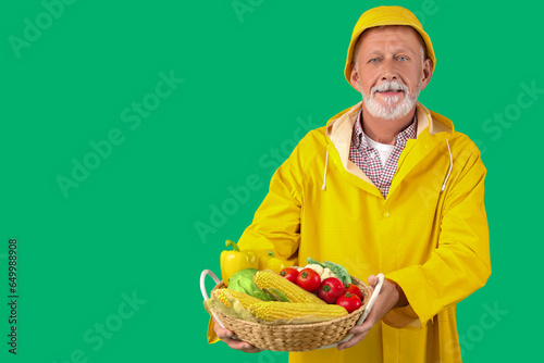 Mature male farmer with wic...