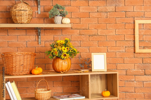 Shelves with pumpkins, flow...