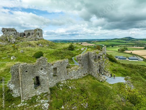 Aerial view of Dunamase legendary Irish hilltop castle ruin with cloudy blue sky photo