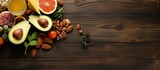Choosing healthy fats wooden background from above