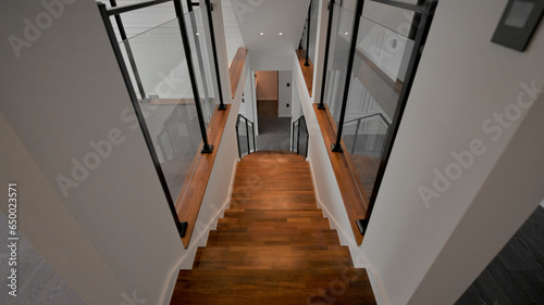 The stairs leading down to the basement were decorated with a nice and chic feel