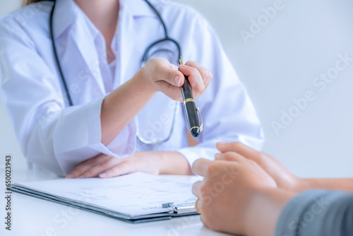 hand holding pen, Doctors advice report health examination results and recommend medication to patients, occupational consultation medical checkup program concept