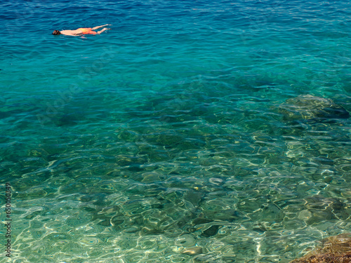 crystal clear water of Adriatic sea in Brela on Makarska Riviera, Dalmatia, Croatia