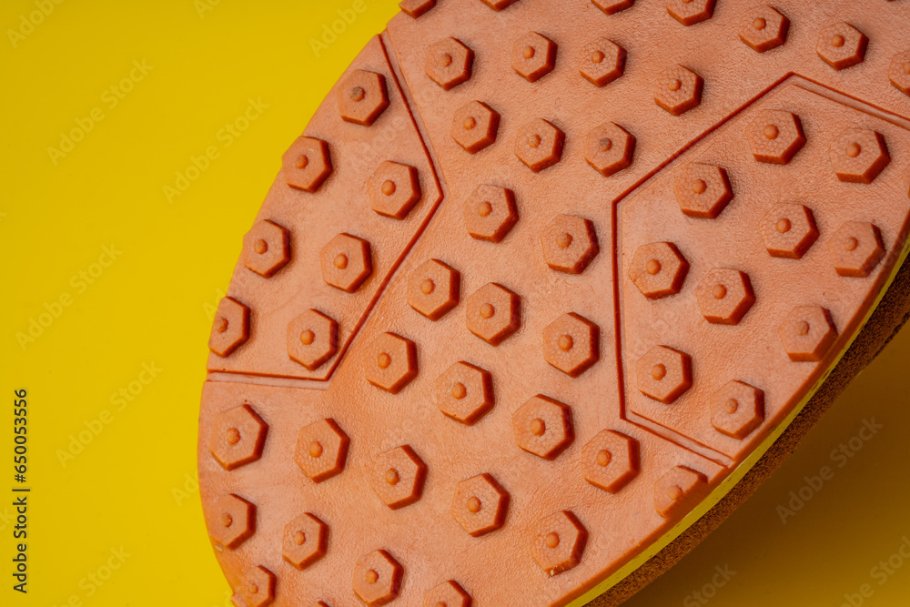 Rubber sole of a sports sneaker close up