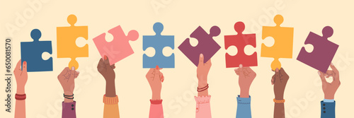 Diverse multiracial hands holding a pieces of jigsaw. Team cooperation and communication. Hand drawn vector vector illustration isolated on light background, flat cartoon style.