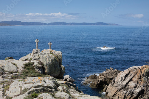 White crosses on the coast of Cavo de O Roncudo e, Corme, Ponteceso. Coast of Death. Crosses of Os Poliños. photo