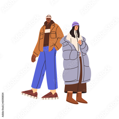 Modern young couple wearing fashion clothes. Man and woman standing in trendy outfits for autumn, winter season. Stylish casual apparel. Flat graphic vector illustration isolated on white background