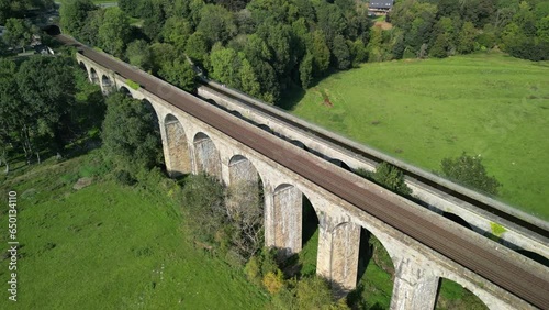 Fly over Chirk railway Viaduct, revealing Aqueduct and valley - aerial drone anti-clockwise rotate - Welsh, English border, Sept 23 photo