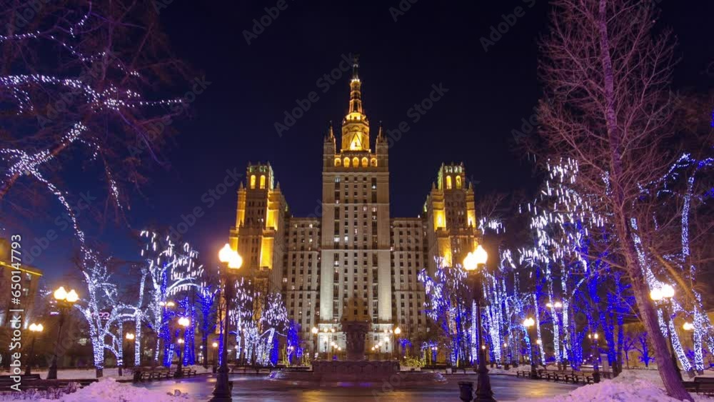 Timelapse Hyperlapse of Stalin's Famous Skyscraper on Kudrinskaya Square at Winter Night, Moscow, Russia. Illuminated Cityscape and Landmark Architecture framed by decoration Timelapse Hyperlapse of Stalin's Famous Skyscraper on Kudrinskaya Square at Winter Night, Moscow, Russia. Illuminated Cityscape and Landmark Architecture framed by decoration
