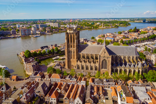 Dordrecht Netherlands, skyline of the old city of Dordrecht with church and canal buildings photo