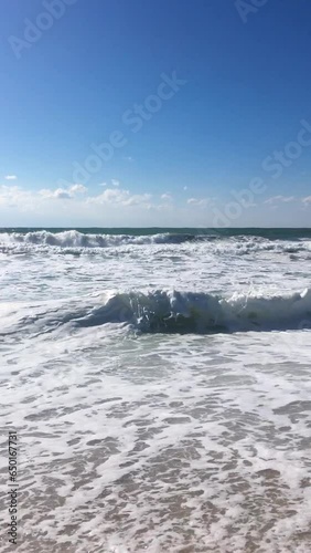 Waves on the sea, view from the sandy beach, high sound quality