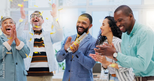 Creative people, applause and confetti in celebration for winning, team achievement or unity at office. Group of happy employees clapping in success for teamwork, promotion or startup at workplace