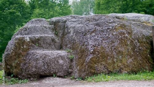 Nicgale Great Stone, Latgale, Latvia.
Big boulder of Nicgal is the biggest known boulder in Latvia. 
To carve in stone 3 steps. Landmark of Latvia. The pride of the country. photo