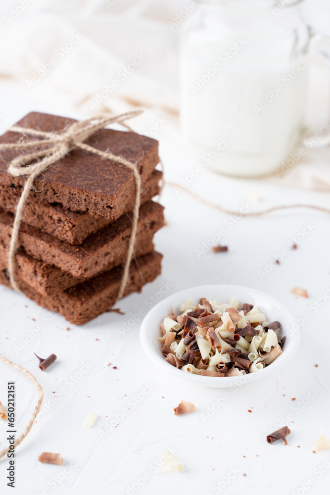 Homemade brownies on a white background. Cakes with chocolate and cocoa.