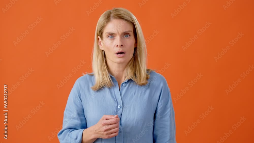 Woman expressing shocking emotions when hearing bad news Stock Video