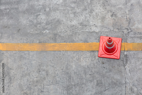 orange road cone on street