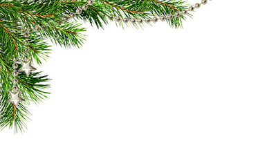 Christmas corner arrangement with green pine twigs and silver garland isolated on white or transparent background