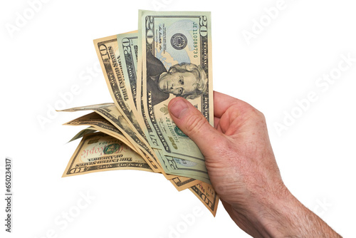 Obraz na płótnie A hand holding, giving or paying American dollars in 10 and 20 banknotes, paper currency, isolated against a transparent background. w salonie