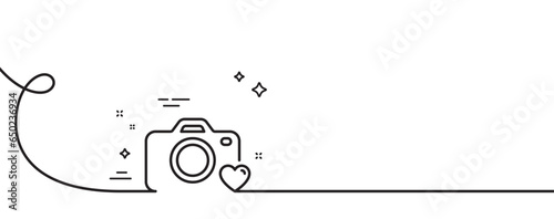 Photo camera line icon. Continuous one line with curl. Love photography sign. Heart symbol. Photo camera single outline ribbon. Loop curve pattern. Vector