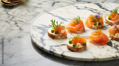 canapés with salmon on a red plate.