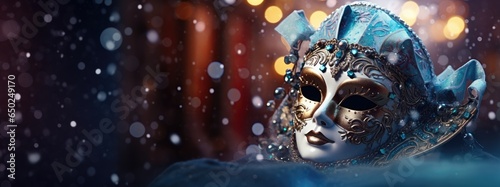 Venetian carnival beautifully decorated mask on blurred snowy bokeh background in Venice Italy for vacation travel promotion © Wendy2001