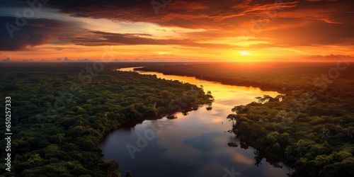 sunset over the amazon river. Lush jungle. Planet\'s lungs.  Environmental preservation. earth\'s lungs