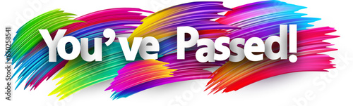 You've passed paper word sign with colorful spectrum paint brush strokes over white.