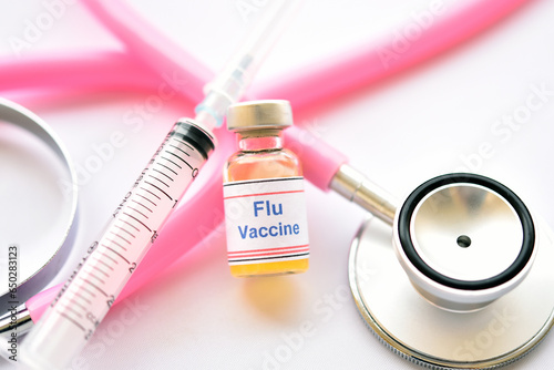 Bottle of Flu vaccine for injection, protective vaccine for influenza virus photo