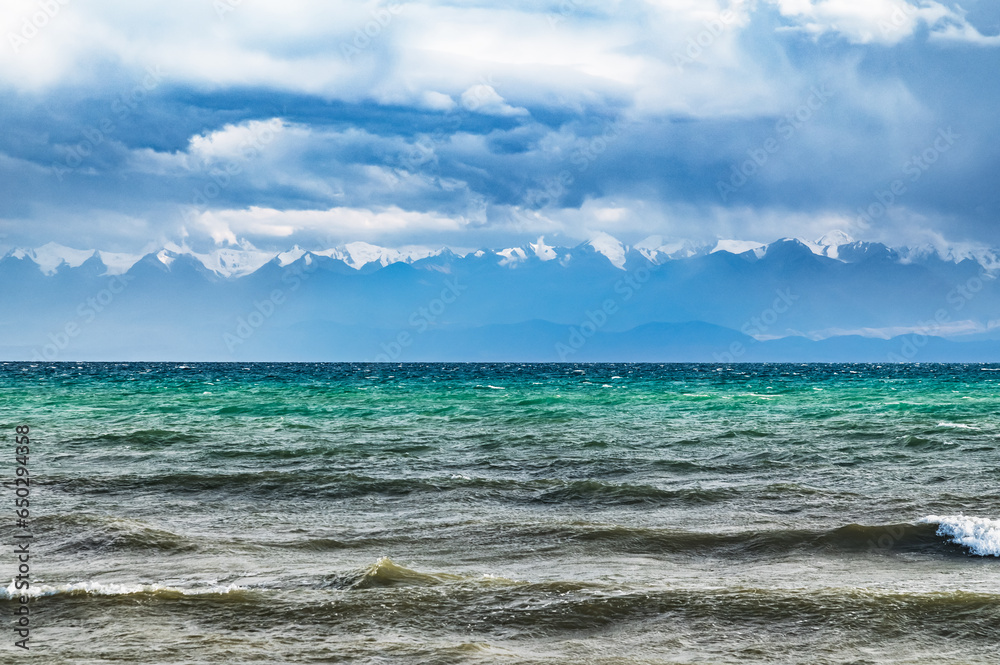 Issyk-Kul after rain. View of the mountains on the opposite bank.