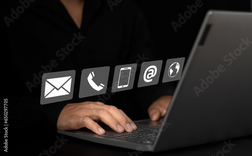 Man using laptop to search the web, find information, contact, have a home office concept contact us.