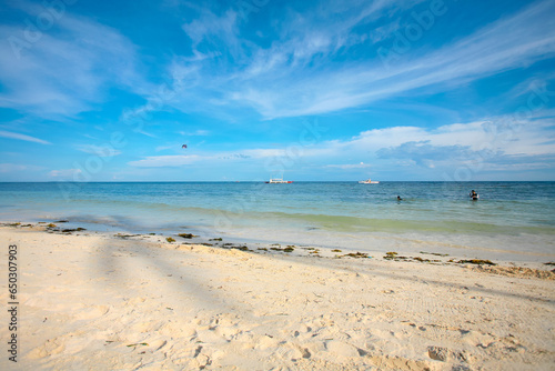 Beautiful beach with blue waters  white sand and clear sky at Alona Beach  Bohol  Philippines.