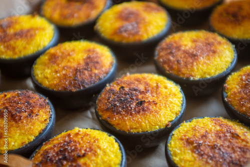 pastel de choclo, corn cakes, in clay saucers